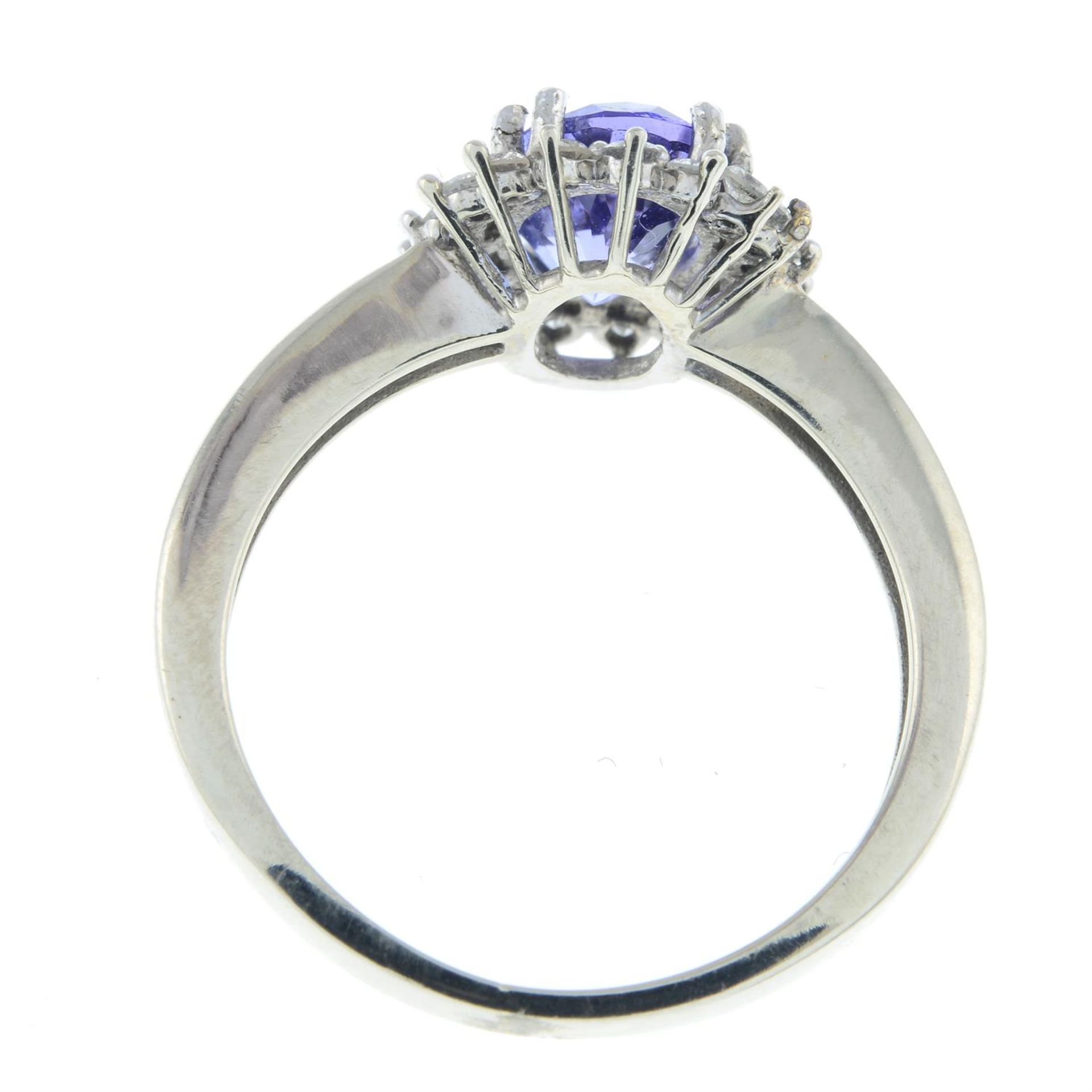 A tanzanite and diamond cluster ring. - Image 2 of 2