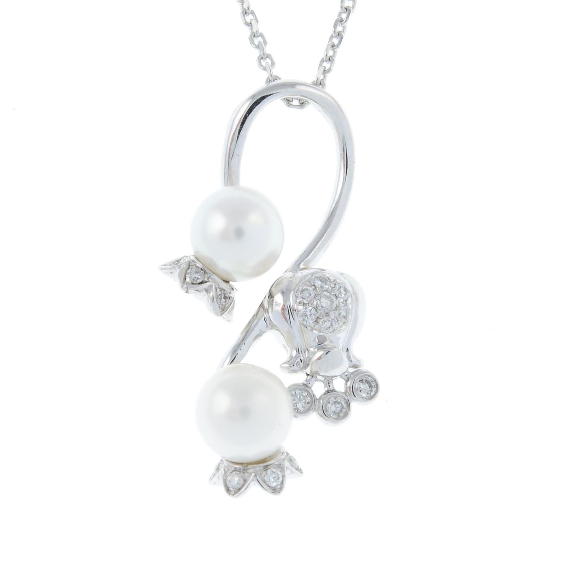 A 9ct gold cultured pearl and diamond pendant, with chain.