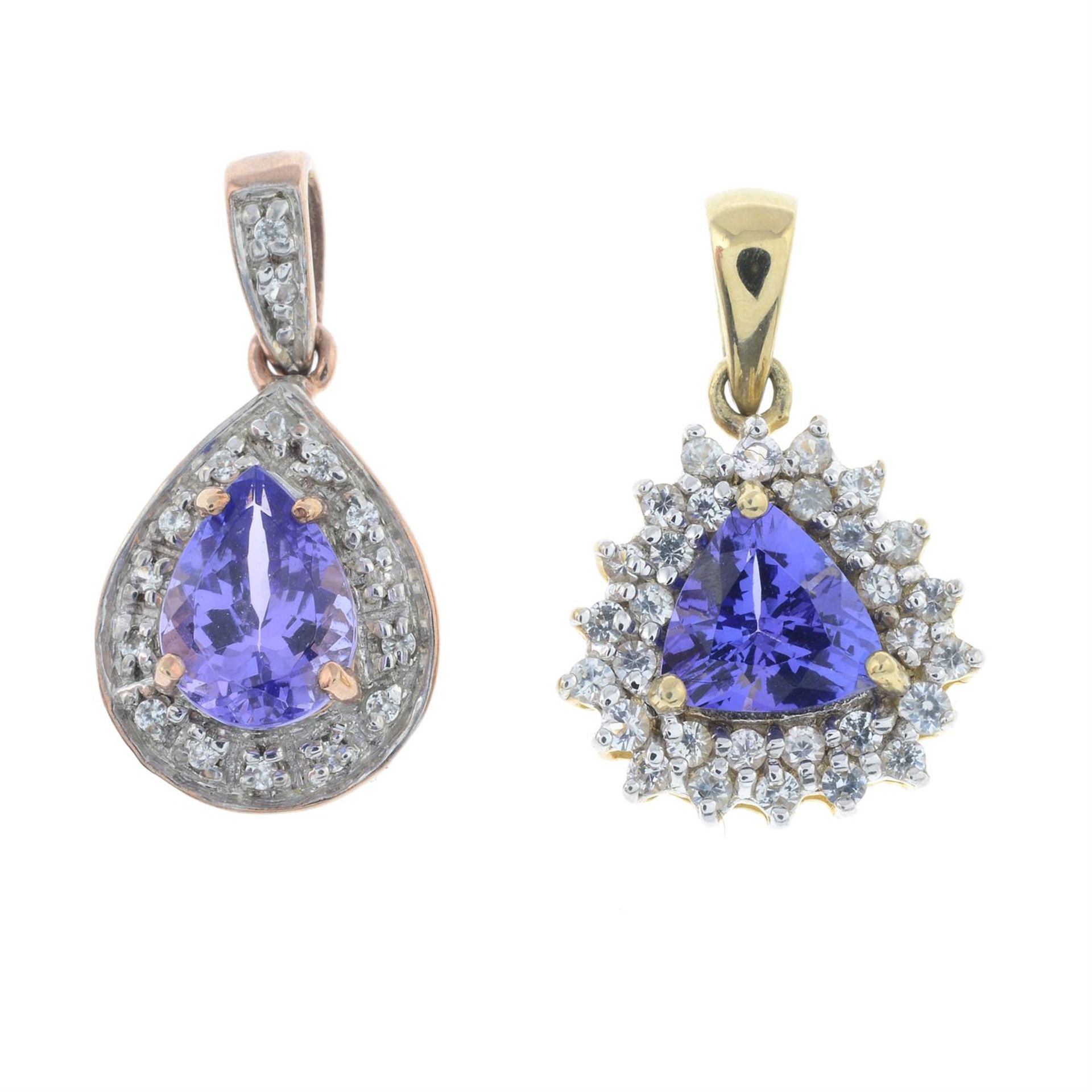 Two tanzanite and colourless gem pendants.