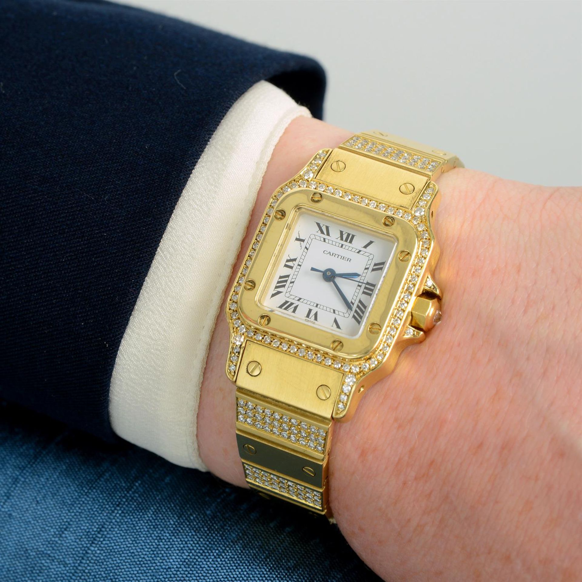 CARTIER - an 18ct gold diamond set Santos bracelet watch, 24mm. - Image 5 of 5