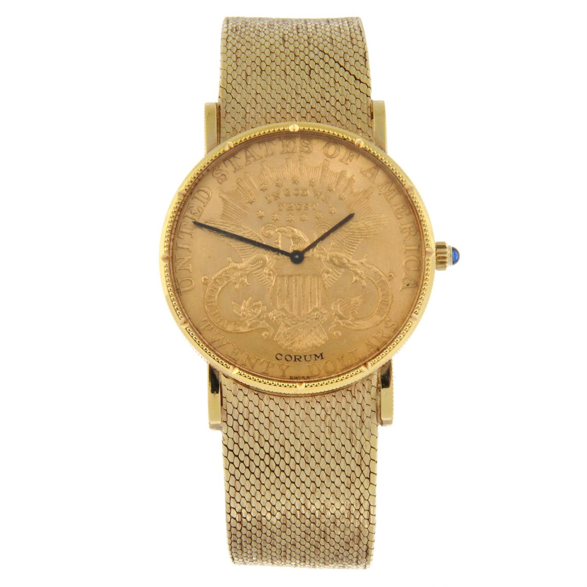 CORUM - an 18ct yellow gold Twenty Dollar Coin bracelet watch, 35mm.