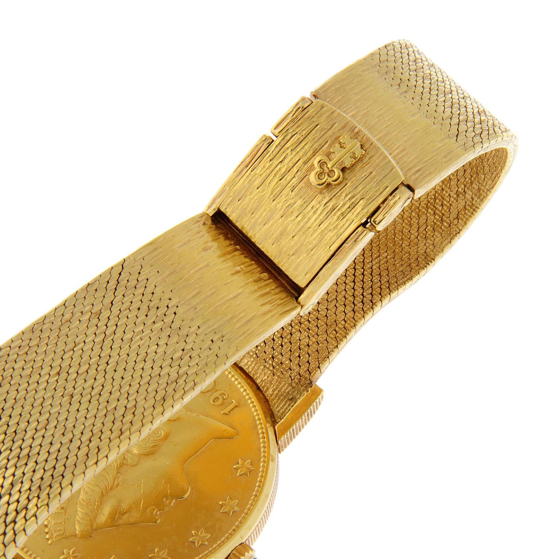 CORUM - an 18ct yellow gold Twenty Dollar Coin bracelet watch, 35mm. - Image 2 of 6