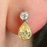 A pair of bi-colour 18ct gold pear-shape 'light yellow' diamond earrings, with brilliant-cut