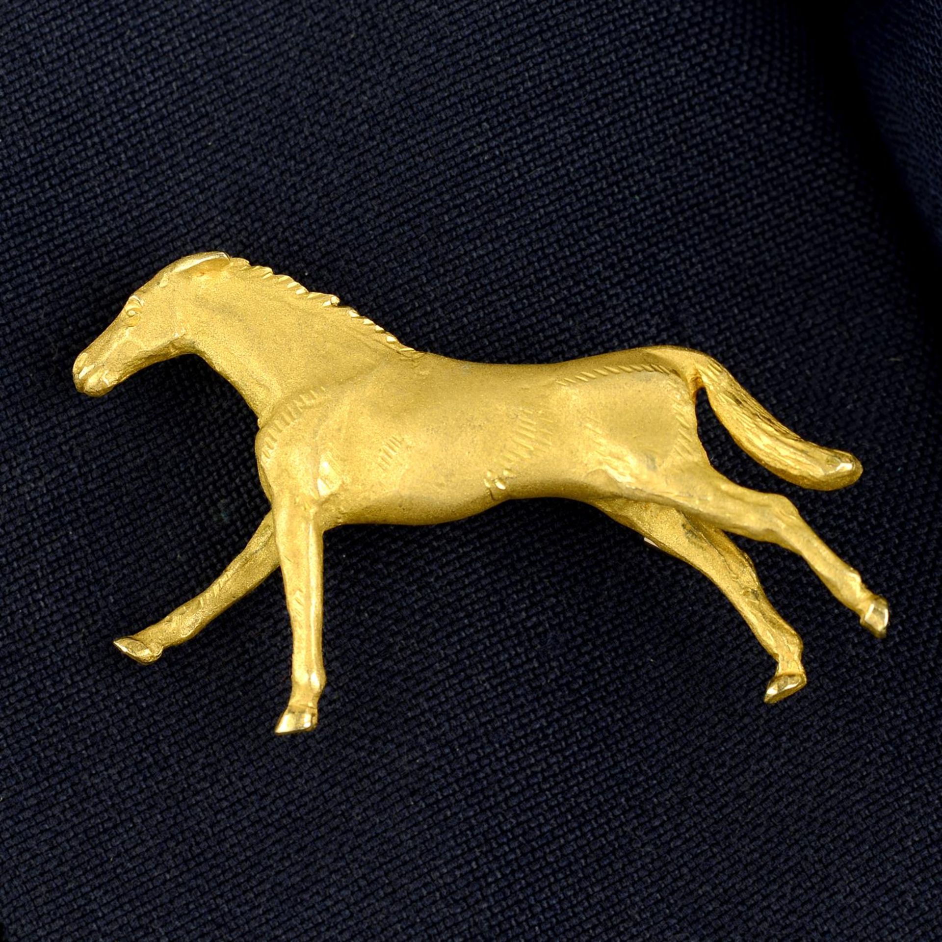 A 9ct gold horse brooch, by Alabaster & Wilson.