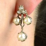 A pair of old-cut diamond and cultured pearl earrings.