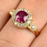 A late 19th century gold ruby and old-cut diamond cluster ring.