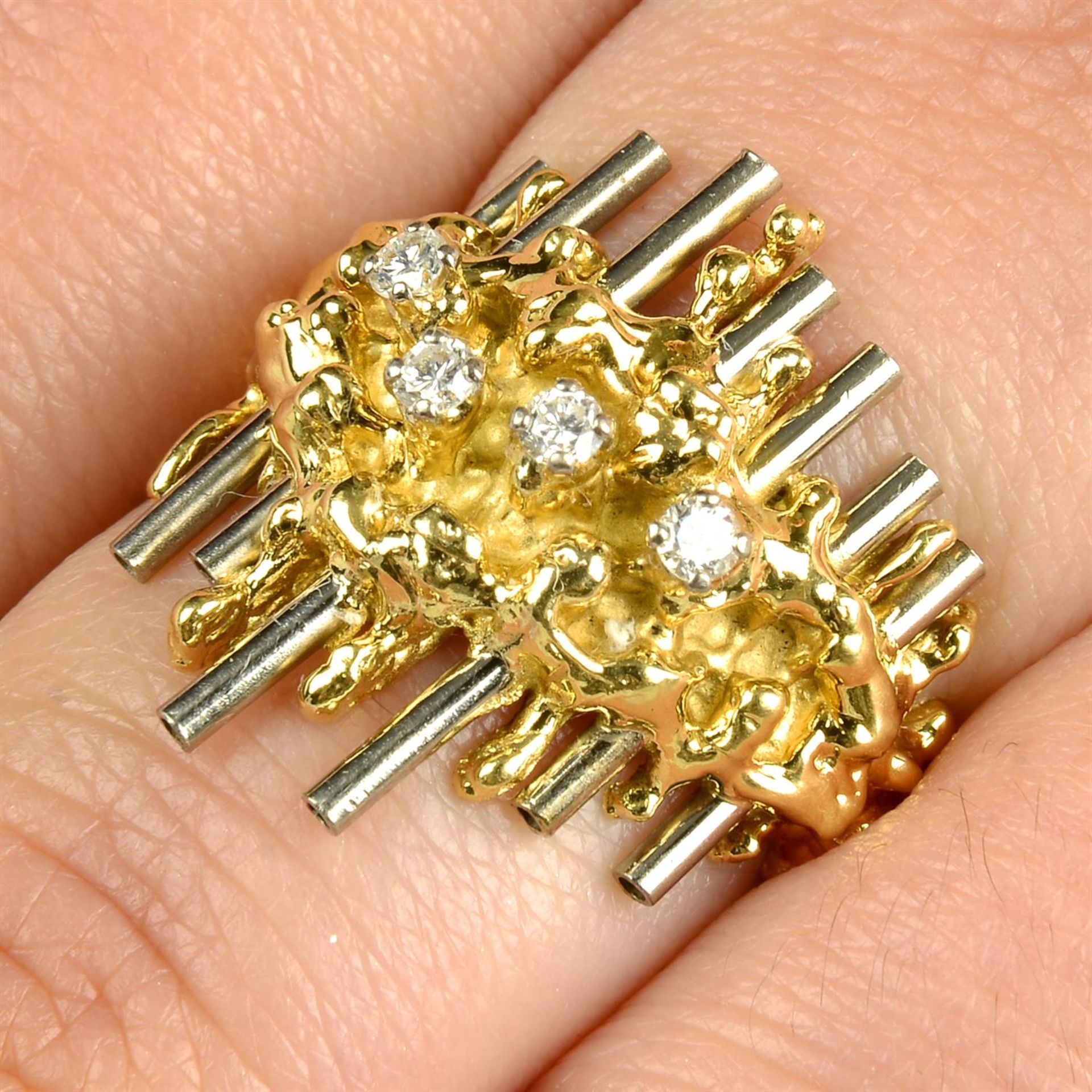 A 1970s bi-colour 18ct gold brilliant-cut diamond ring, by David Thomas.