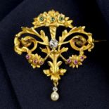 A French Art Nouveau 18ct gold old-cut diamond, emerald and ruby scrolling foliate brooch/pendant,