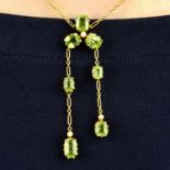 An early 20th century 15ct gold peridot and split pearl negligee pendant.