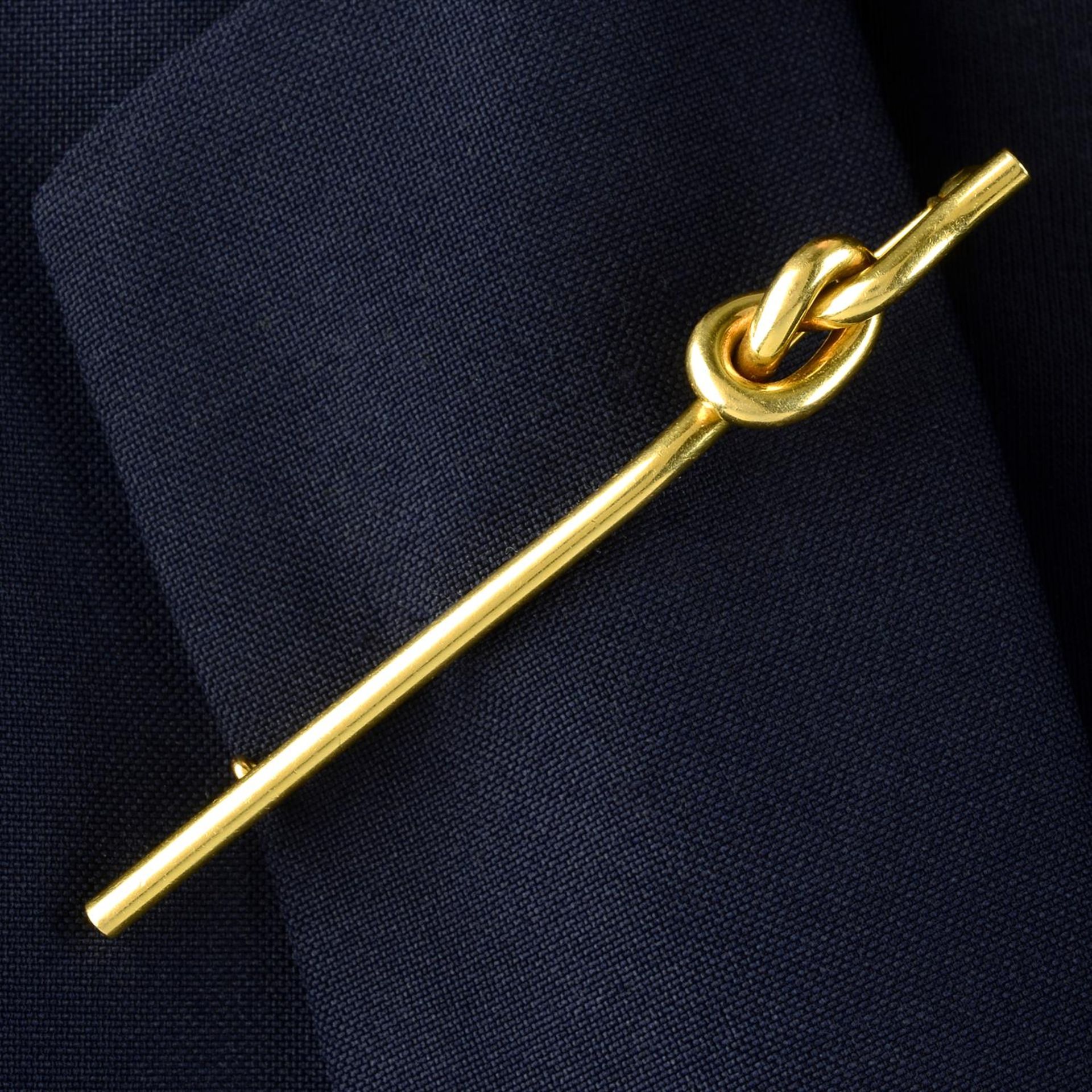 A 1970s 18ct gold 'Lover's Knot' brooch, by Cartier.