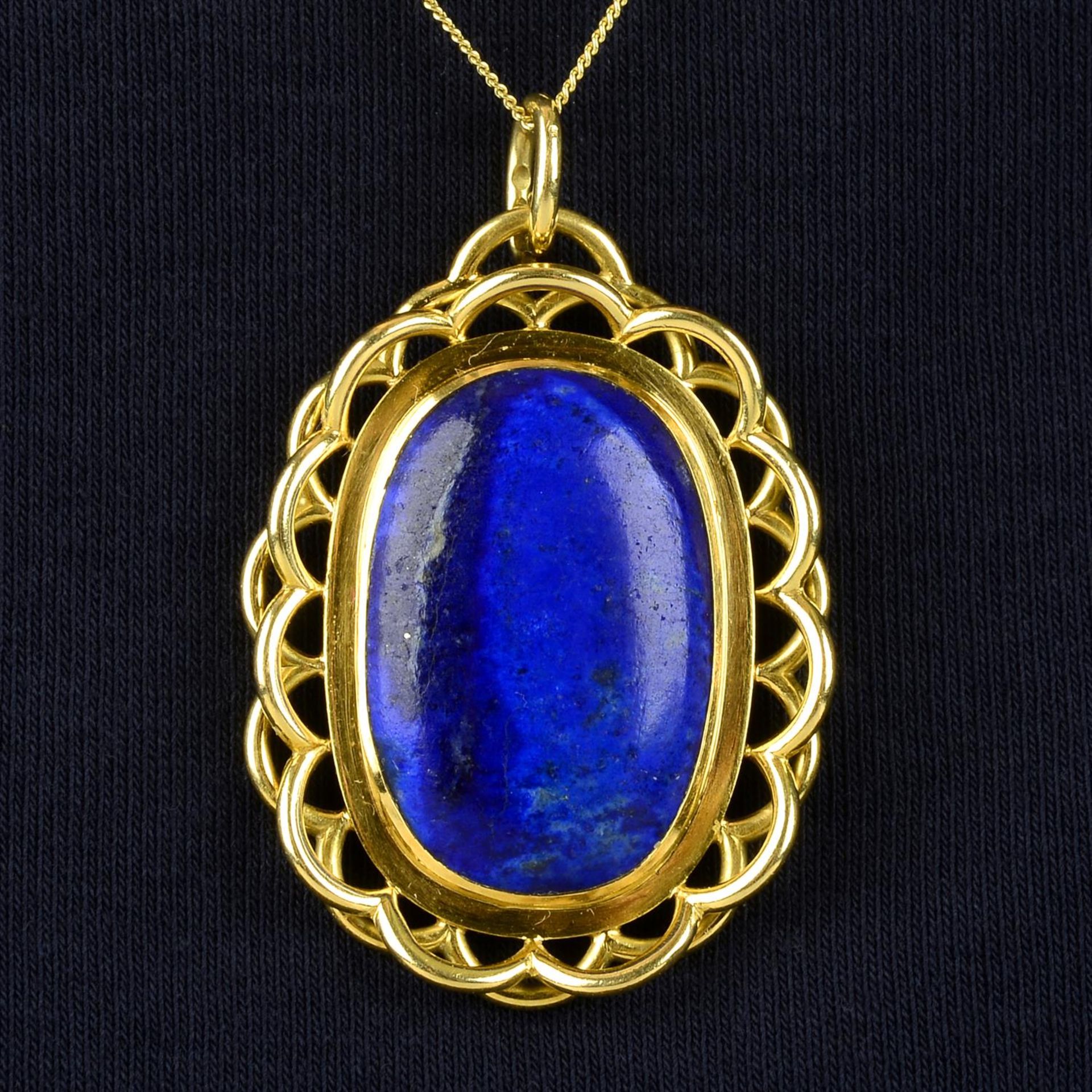 An early to mid 20th century 18ct gold lapis lazuli pendant.