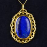 An early to mid 20th century 18ct gold lapis lazuli pendant.