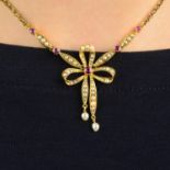 An early 20th century 15ct gold ruby, split and seed pearl bow necklace.