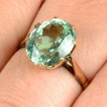 A bluish green tourmaline single-stone ring.