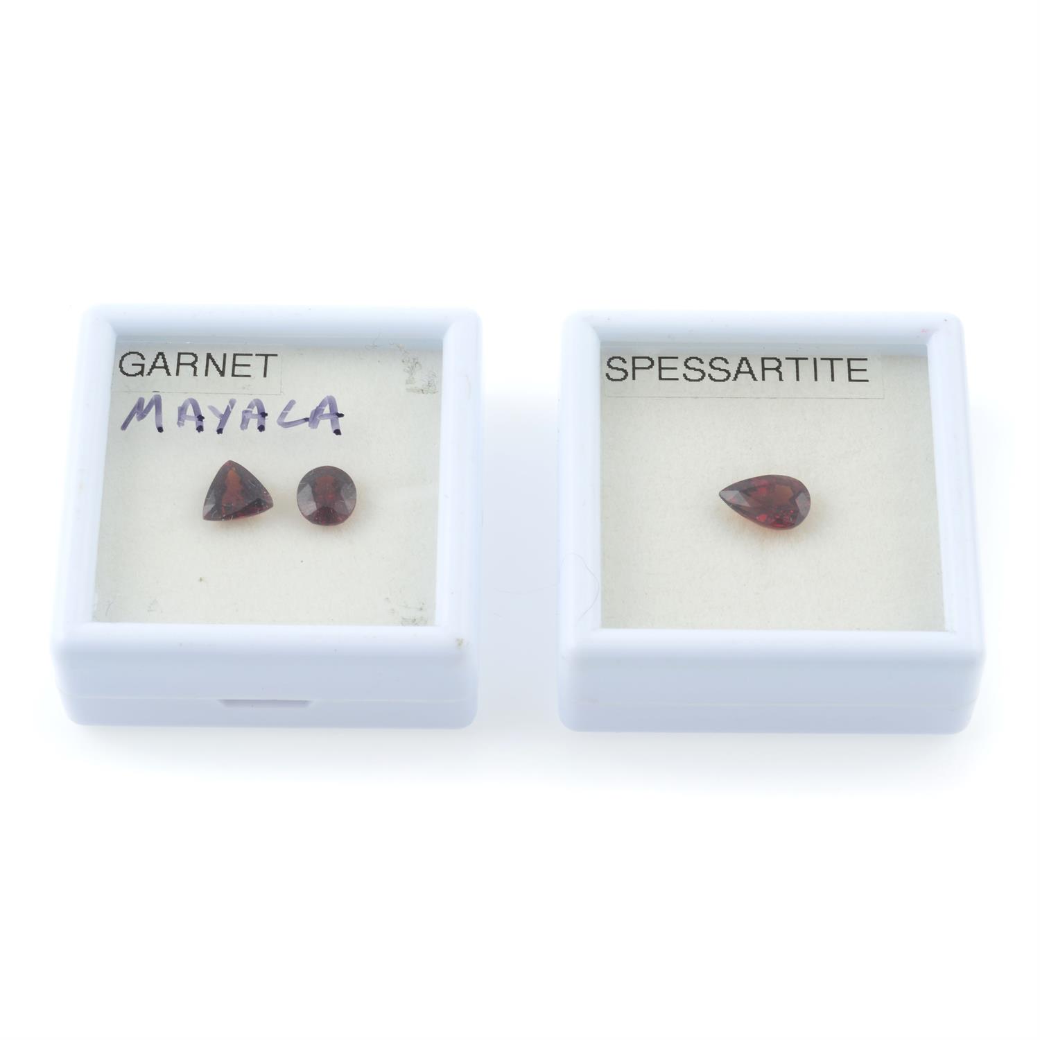 Three vari-shape garnets, weighing 4.48ct