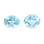 Two oval shape aquamarines, weighing 3.85ct