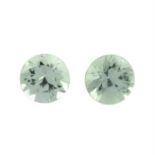 Pair of circular shape green sapphires, weighing 0.76ct