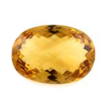 An oval shape citrine, weighing 101.85ct