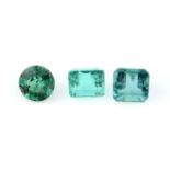 Three vari-shape emeralds, weighing 1.70ct