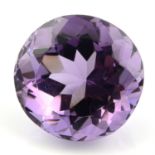 A circular shape amethyst, weighing 26.11ct