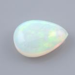 A pear shape opal cabochon, weighing 6.1ct