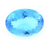 An oval shape topaz, weighing 72.89ct