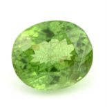 An oval shape peridot, weighing 15.09ct