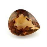 A pear shape topaz, weighing 37.98ct