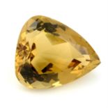 A triangular shape citrine, weighing 38.38ct