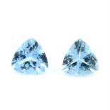 Two triangular shape aquamarines, weighing 1.96ct