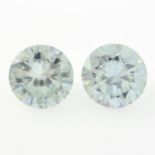A pair of circular-shape synthetic moissanites, total weight 5.09cts.