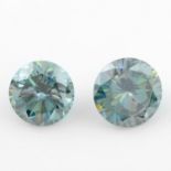 Two circular-shape synthetic green moissanite, weighing 14.53ct