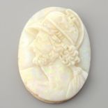 An oval shape opal cameo, weighing 30.10ct. Featuring a man