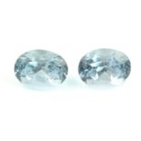 Two oval shape aquamarines, weighing 3.99ct