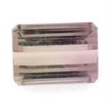 A rectangular shape bi colour tourmaline, weighing 10.90ct