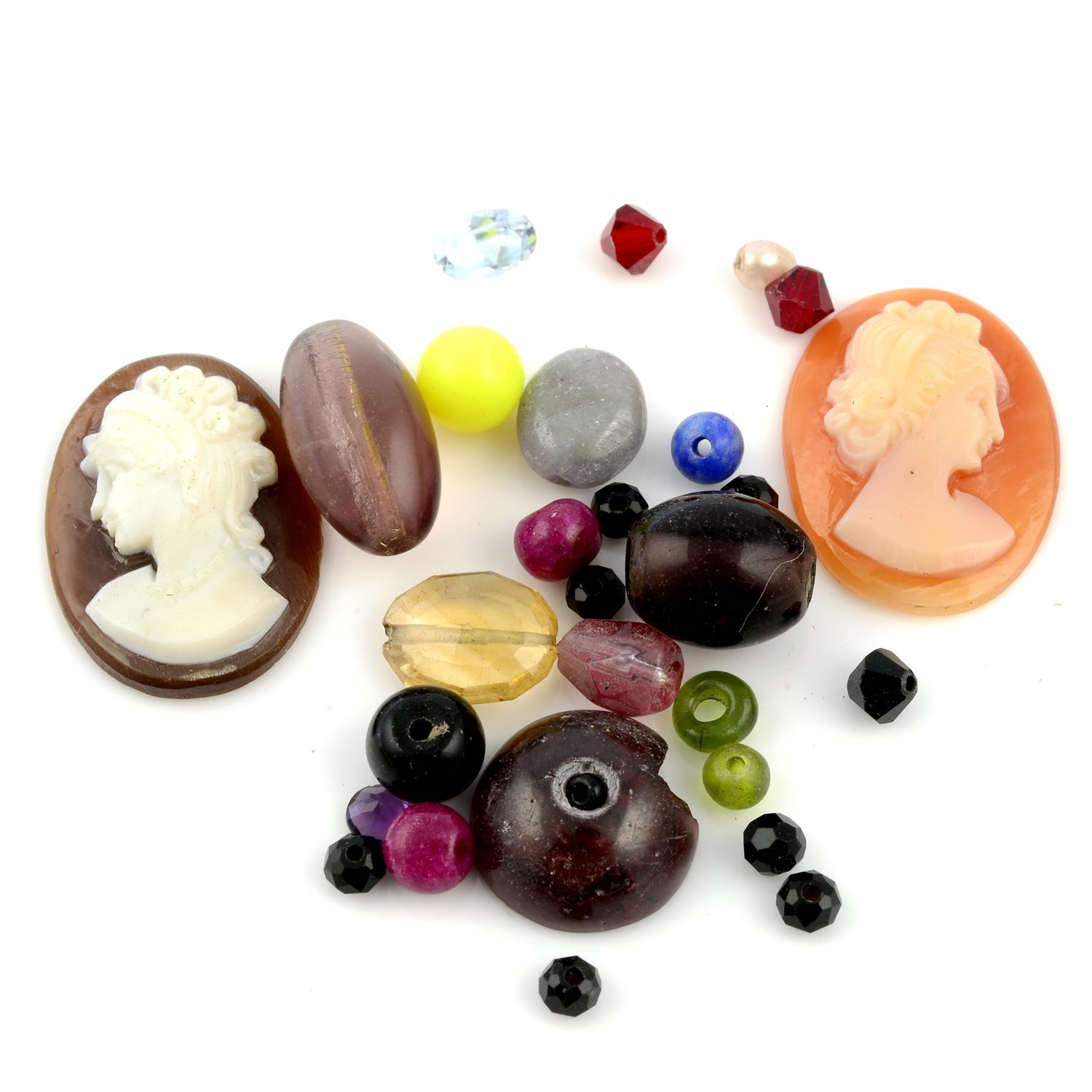 Nine cameos and selection of beads, weighing 559grams. To include aquamarines, rubies,