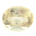 An oval shape scapolite, weighing 19.03ct