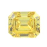 A rectangular shape fancy vivid yellow diamond, weighing 0.17ct