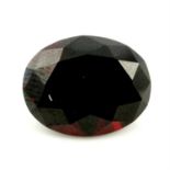 An oval shape garnet, weighing 8.94ct