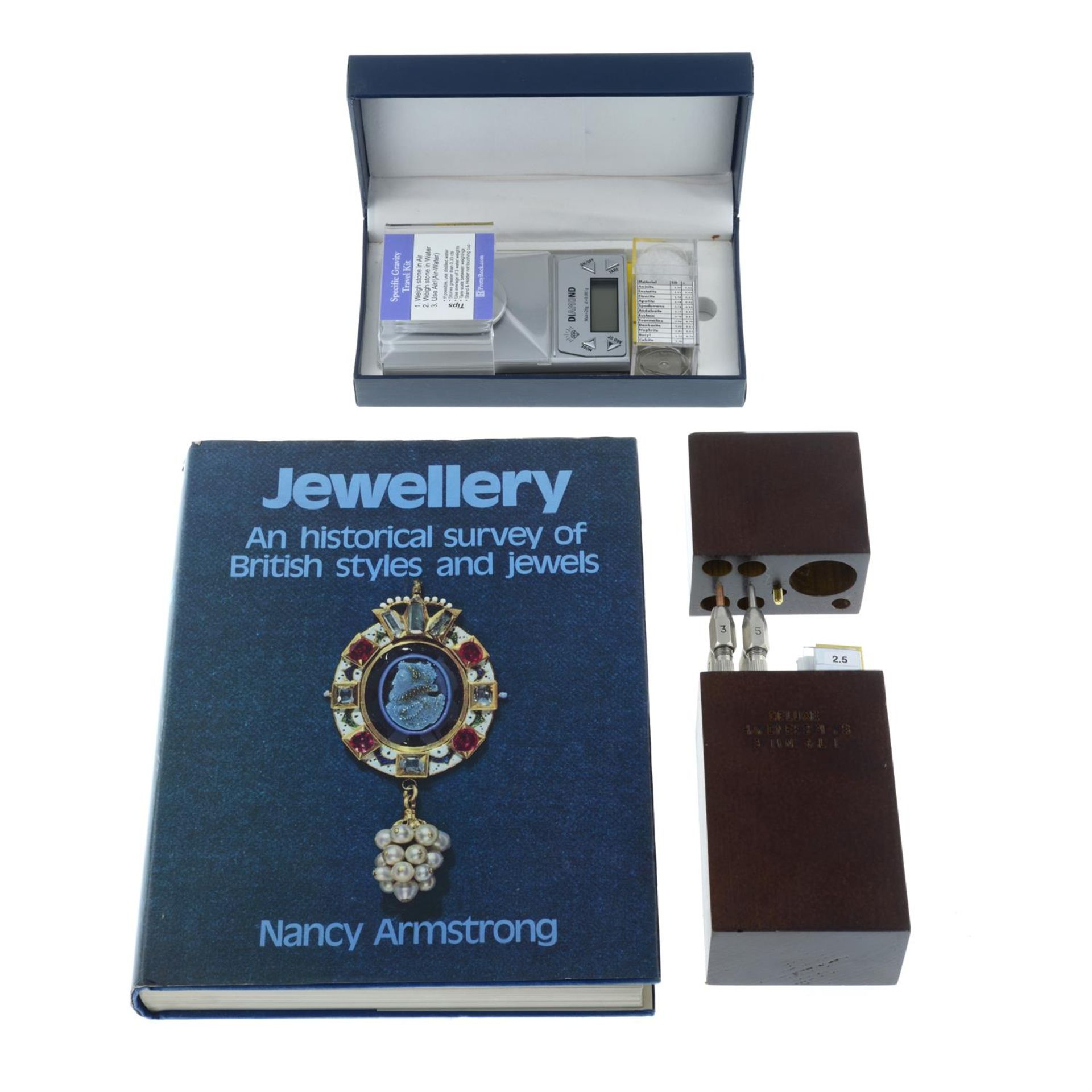 A specific Gravity travel kit, a hardness kit and a jewellery book