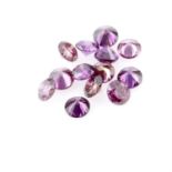 Selection of circular shape 'purple' diamonds, weighing 0.98ct