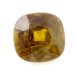 A cushion cut sphene, weighing 2.62ct