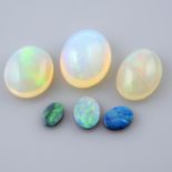 Five oval shape opal cabochons and twelve opal doublets, weighing 28.12ct