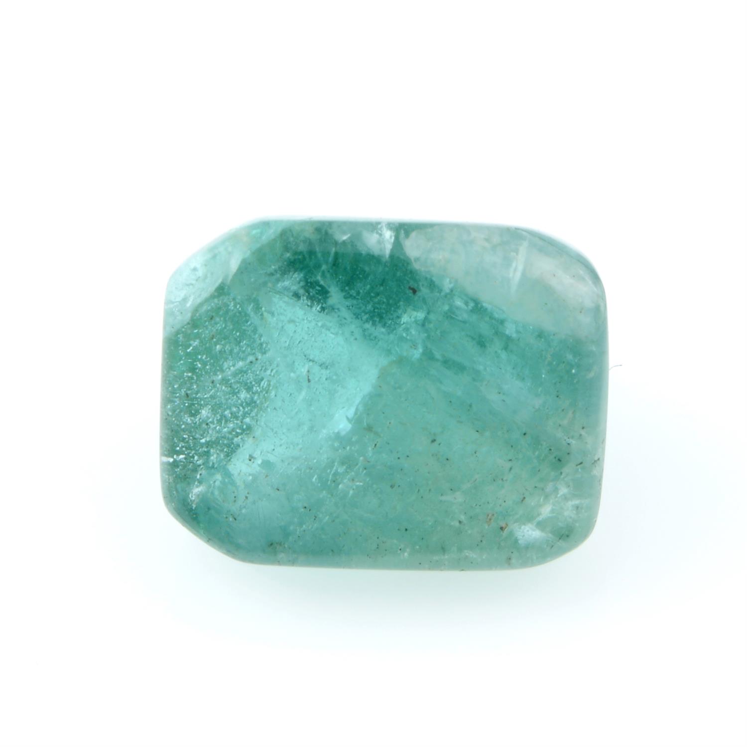 A fancy shape emerald, weighing 6.35ct