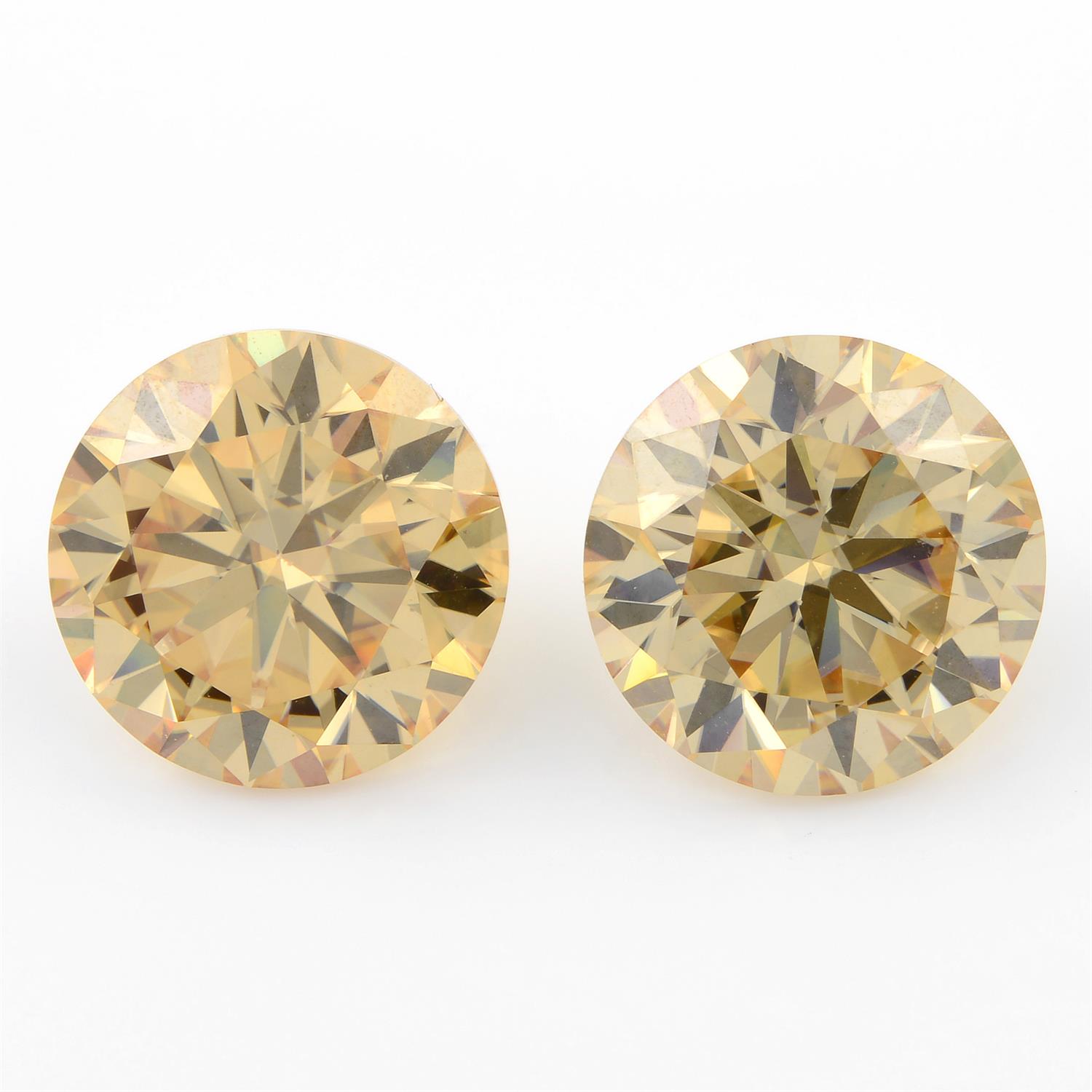 Pair of circular shape synthetic yellow moissanites, weighing 9.54ct