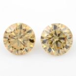 Pair of circular shape synthetic yellow moissanites, weighing 9.54ct