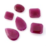 Six vari-shape rubies, weighing 31.71ct