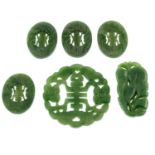 Eleven pieces of carved jade featuring chinese characters and floral subjects, weighing 79grams