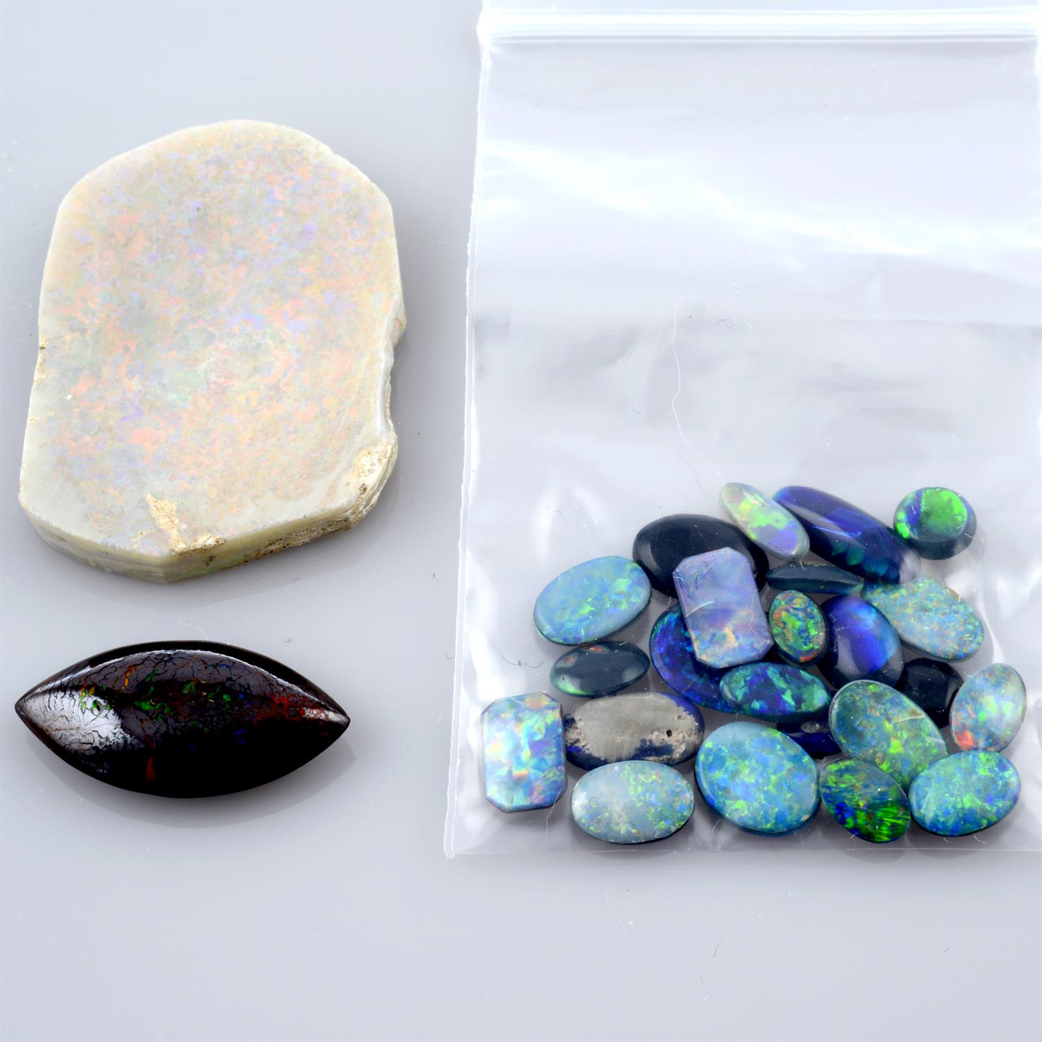 Selection of vari-shape opal doublets, boulder opal and two pieces of rough opals, weighing 118grams - Image 2 of 2