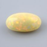 An oval shape opal cabochon, weighing 23.24ct